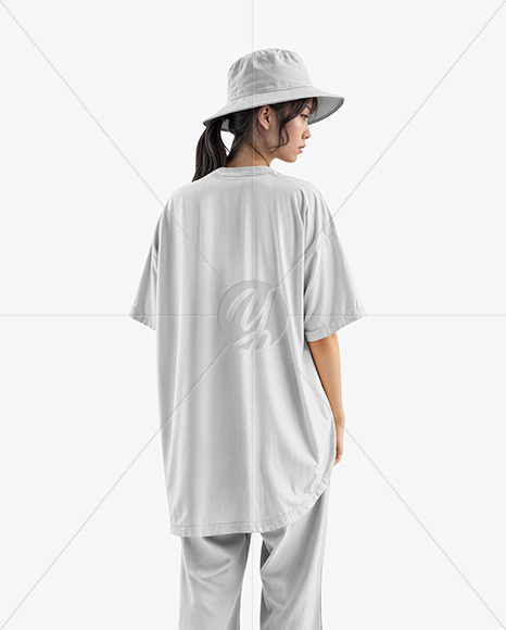 A Young Asian Woman Wearing a Bucket Hat and Oversize T-Shirt Mockup