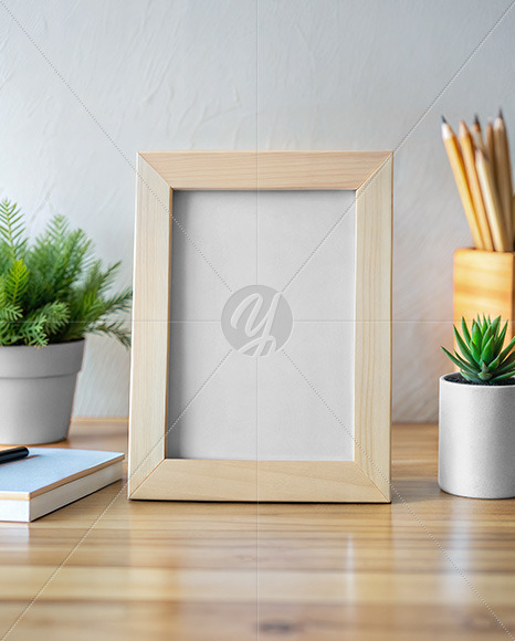 Wooden Photo Frame on a Table Mockup