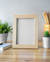 Wooden Photo Frame on a Table Mockup