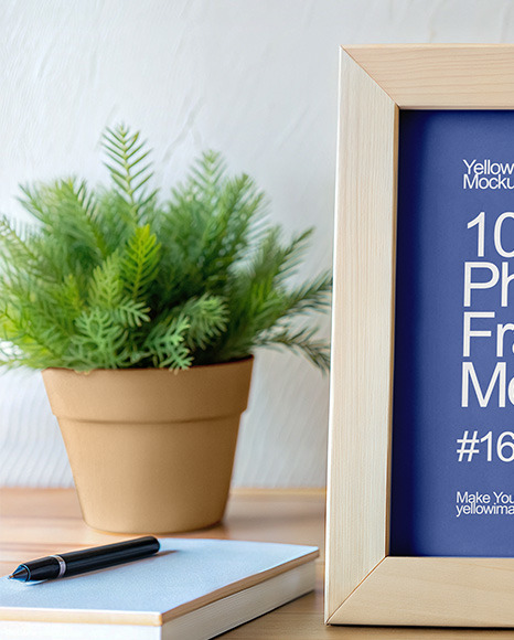 Wooden Photo Frame on a Table Mockup