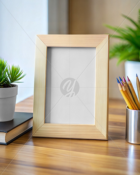 Wooden Photo Frame on a Table Mockup