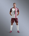 Soccer Player Wearing a Full Kit Mockup