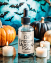 Blue Oil Tincture Dropper Bottle with Halloween Themed Background Mockup