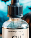 Blue Oil Tincture Dropper Bottle with Halloween Themed Background Mockup