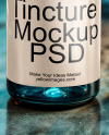 Blue Oil Tincture Dropper Bottle with Halloween Themed Background Mockup