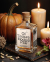 Oil Tincture Square Bottle with Candles and Pumpkin Mockup