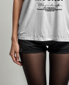 Slim Girl with Spirit of Halloween Mask Wearing a T-Shirt and Shorts Mockup