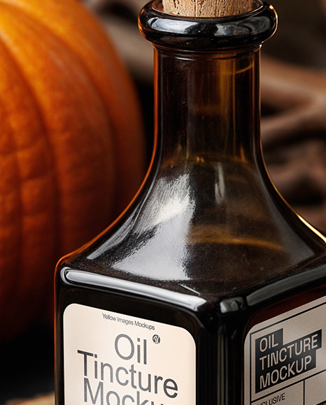 Amber Square Oil Tincture Bottle with Candles and Pumpkin Mockup Amber Square Oil Tincture Bottle with Candles and Pumpkin Mockup