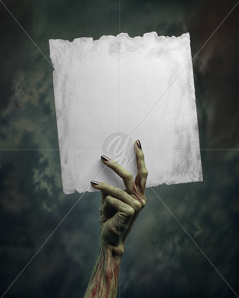 A Zombie Hand Holding a Torn Piece of Paper Mockup