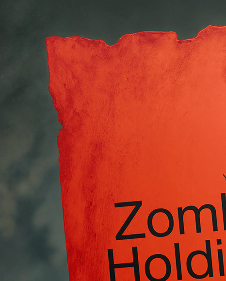 A Zombie Hand Holding a Torn Piece of Paper Mockup