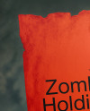 A Zombie Hand Holding a Torn Piece of Paper Mockup