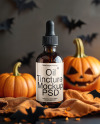 Amber Oil Tincture Dropper Bottle with Halloween Themed Background Mockup