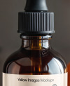 Amber Oil Tincture Dropper Bottle with Halloween Themed Background Mockup