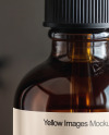 Amber Oil Tincture Dropper Bottle with Halloween Themed Background Mockup