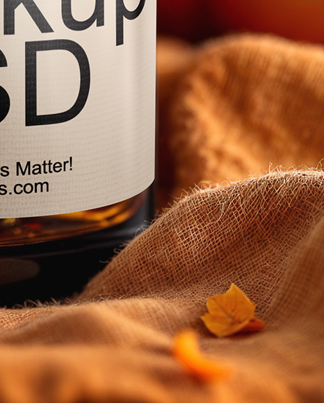 Amber Oil Tincture Dropper Bottle with Halloween Themed Background Mockup