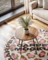 Living Room with Round Rug and Sofa Mockup