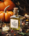 Oil Tincture Square Bottle with Candles and Pumpkin Mockup