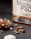 Oil Tincture Square Bottle with Dried Flowers and Pumpkin Mockup