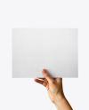 Hand Holding a Paper Sign Mockup