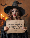 Smiling Halloween Witch Holding a Paper Sign Mockup