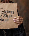 Smiling Halloween Witch Holding a Paper Sign Mockup