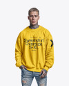 A Man with Tattoos Wearing an Oversize Sweatshirt and Jeans Mockup