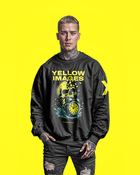 A Man with Tattoos Wearing an Oversize Sweatshirt and Jeans Mockup