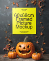 Poster on a Wall with Branches and Pumpkins Mockup
