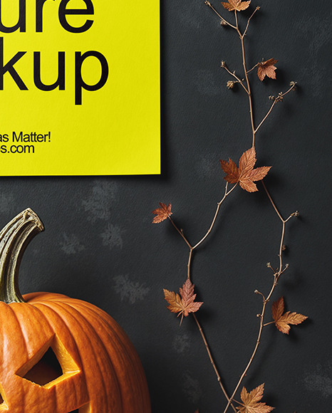 Poster on a Wall with Branches and Pumpkins Mockup
