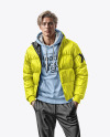 A Man Wearing a Puffer Jacket and a Hoodie Mockup