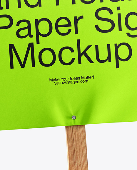 A Hand Holding a Paper Sign with Wooden Handle Mockup