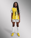 A Black Woman with Dreadlocks Wearing a Full Soccer Kit Mockup