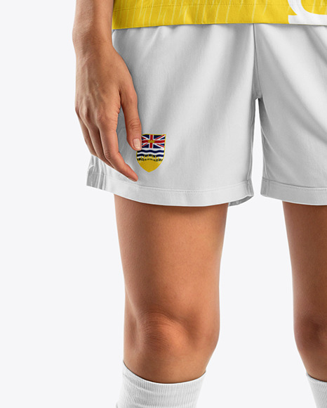 A Young Woman Wearing a Full V-Neck Soccer Kit Mockup