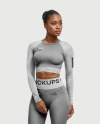 Woman Wearing a Long Sleeve Crop Top and Leggings Mockup