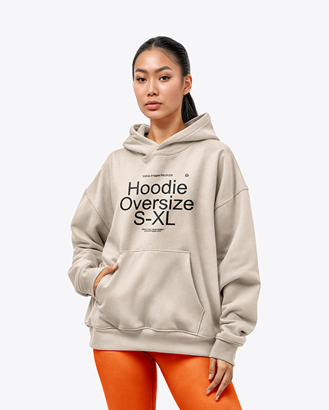 A Woman Wearing an Oversize Hoodie and Leggings Mockup - White+Hoodie+Mockup+With+Shadows+On+The+Background,+Front+...