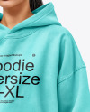 A Woman Wearing an Oversize Hoodie and Leggings Mockup