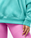 A Woman Wearing an Oversize Hoodie and Leggings Mockup