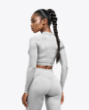 Woman Wearing a Long Sleeve Crop Top and Leggings Mockup