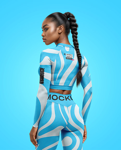 Woman Wearing a Long Sleeve Crop Top and Leggings Mockup