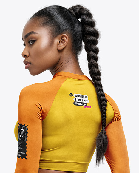 Woman Wearing a Long Sleeve Crop Top and Leggings Mockup