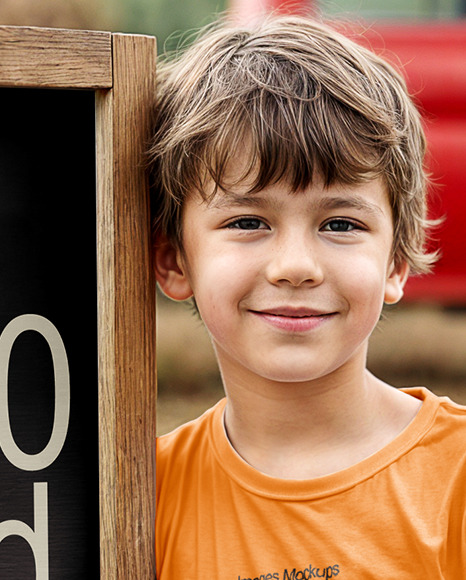Boy Standing Next to Wooden Framed Sign at Pumpkin Patch Mockup