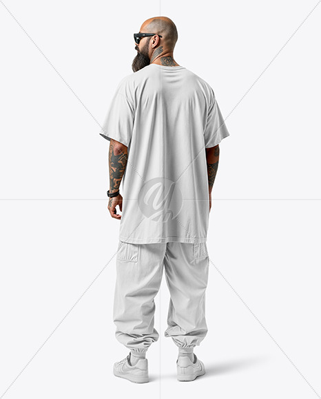 Latino Man with Beard Wearing an Oversize T-Shirt and Pants Mockup