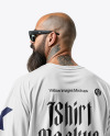 Latino Man with Beard Wearing an Oversize T-Shirt and Pants Mockup