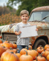Boy Holding Wooden Sign Next to Truck at Pumpkin Patch Mockup