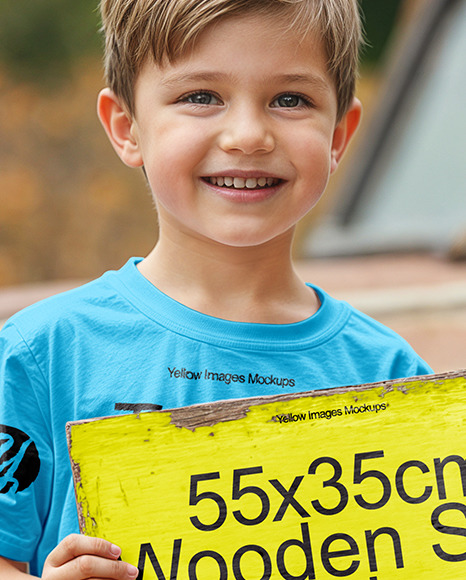 Boy Holding Wooden Sign Next to Truck at Pumpkin Patch Mockup