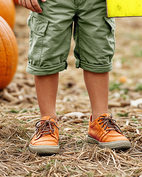 Kid Leaned Hand on Sign at Pumpkin Patch Mockup