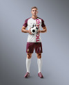 Soccer Player with Ball Wearing a Full Kit Mockup