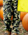 A Boy Leaned Hand on a Sign at a Pumpkin Patch Mockup