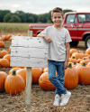 Kid Standing Next to Sign at Pumpkin Patch Mockup