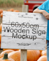 Kid Standing Next to Sign at Pumpkin Patch Mockup